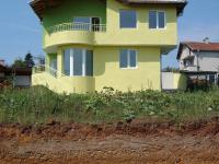 House with landscaped garden and a swimming pool