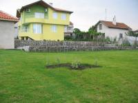 House with landscaped garden and a swimming pool